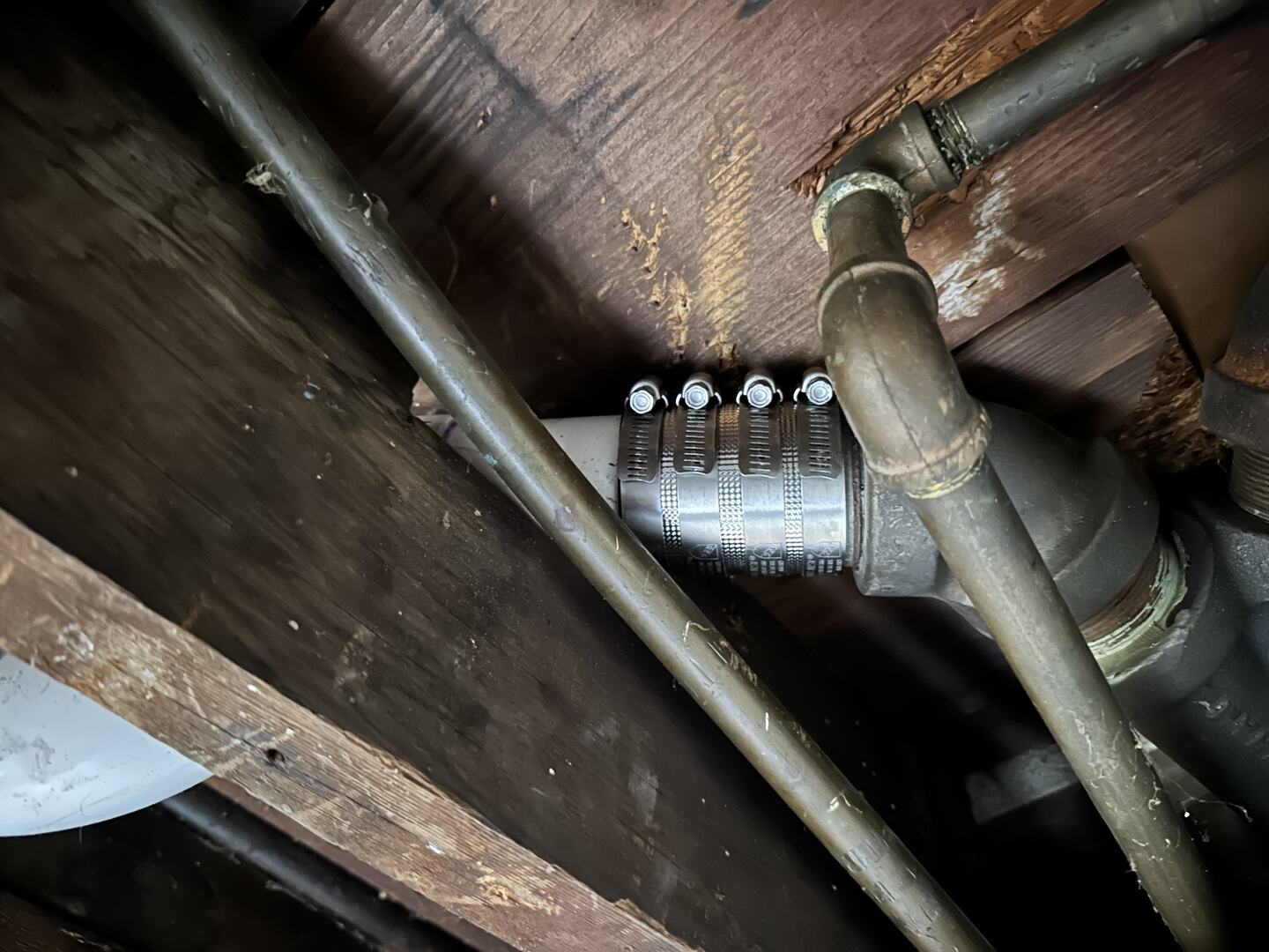 Rubber coupling between new PVC and existing steel