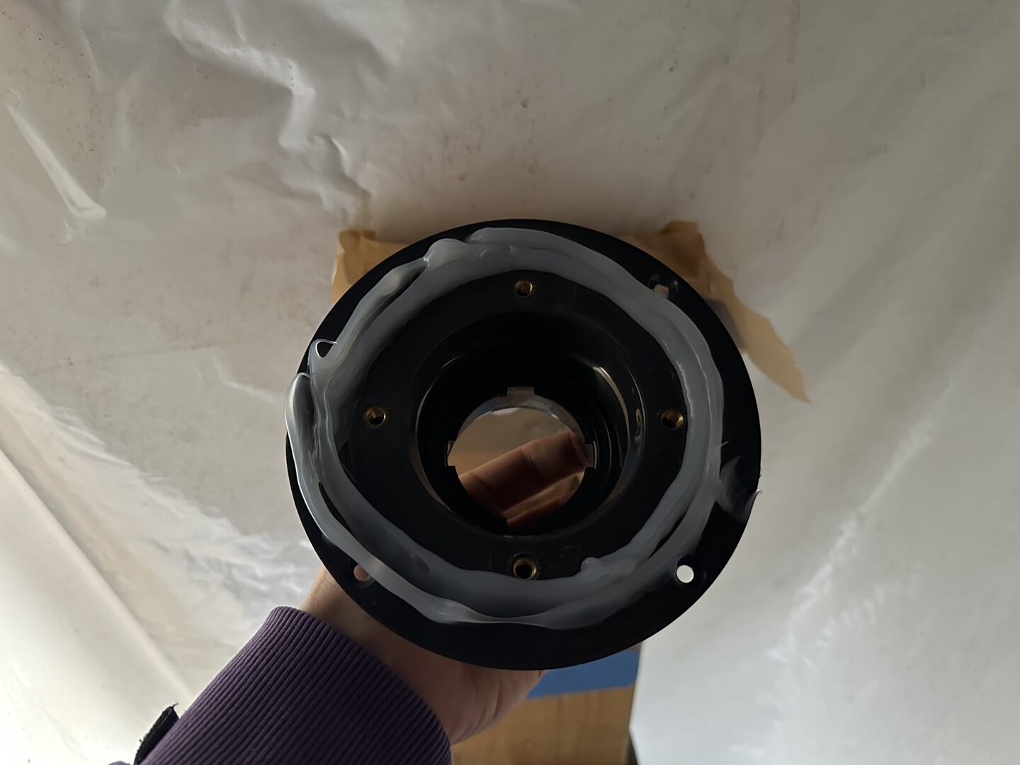 Silicone on bottom of flange