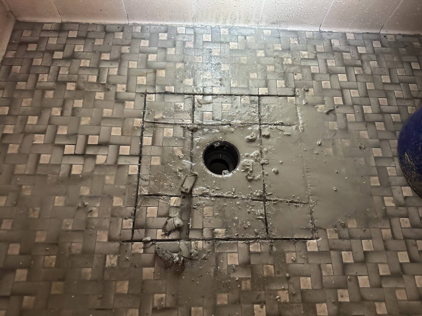 Relief cuts in the tile being removed
