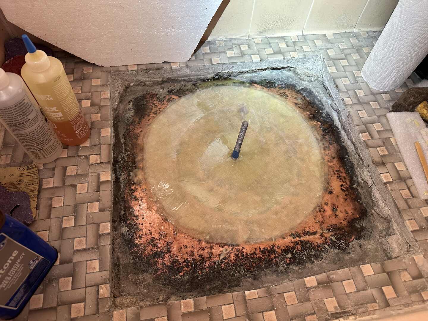 Top layers applied to the shower pan