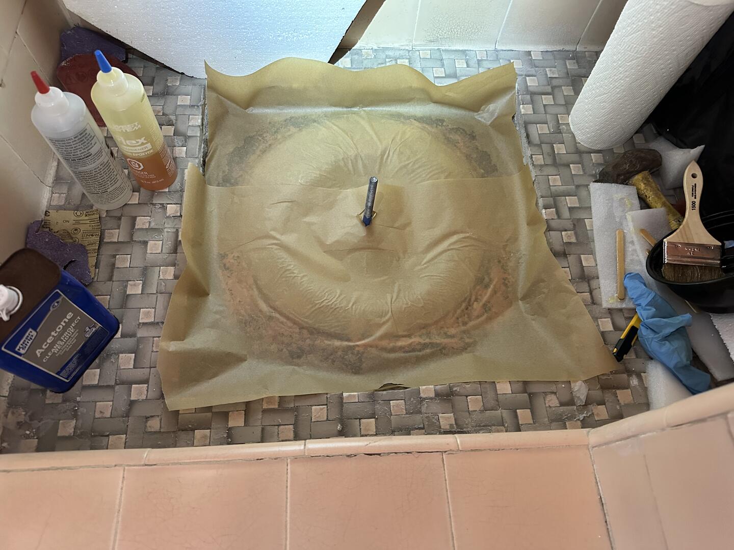 Wax paper on top layers of fiberglass